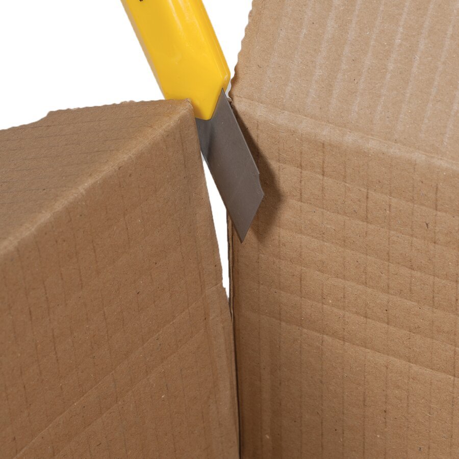 Regulierung der Kartonhöhe mit einem Messer Mit einem Messer wird die Kartonhöhe angepasst